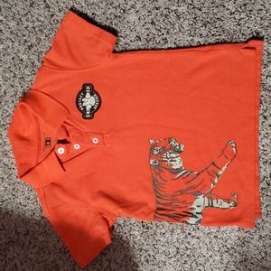 Boys size 5 orange polo shirt with tiger design
